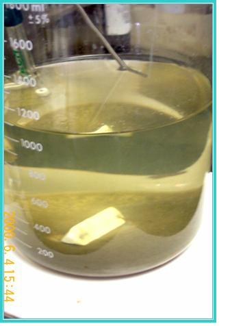 ORL radiator shop water after KB-1 treatment, clear above settled silica