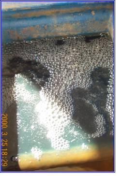 Powell Water E-Cell chamber processing nickel rinse water, clear water with floc forming